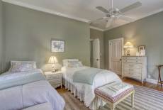 The Pinkney Suite, named after Dr. Ninian Pinkney, Medical Director for the US Navy and once owner of Magnolia Manor, features two twin beds and shared full bathroom. The suite overlooks the Tred Avon and grounds.